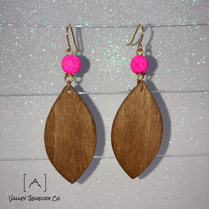 These petite Almond-shaped earrings feature a bright pink Earoma Stone and gold fixtures, making them simple and timeless. Wear these delicate earrings to add a pop of color to your everyday look.

Todd, Todd Mertz, Mertz, Todd Adam Mertz